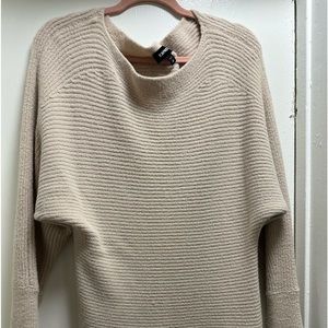 Asymtreical cream colored express sweater